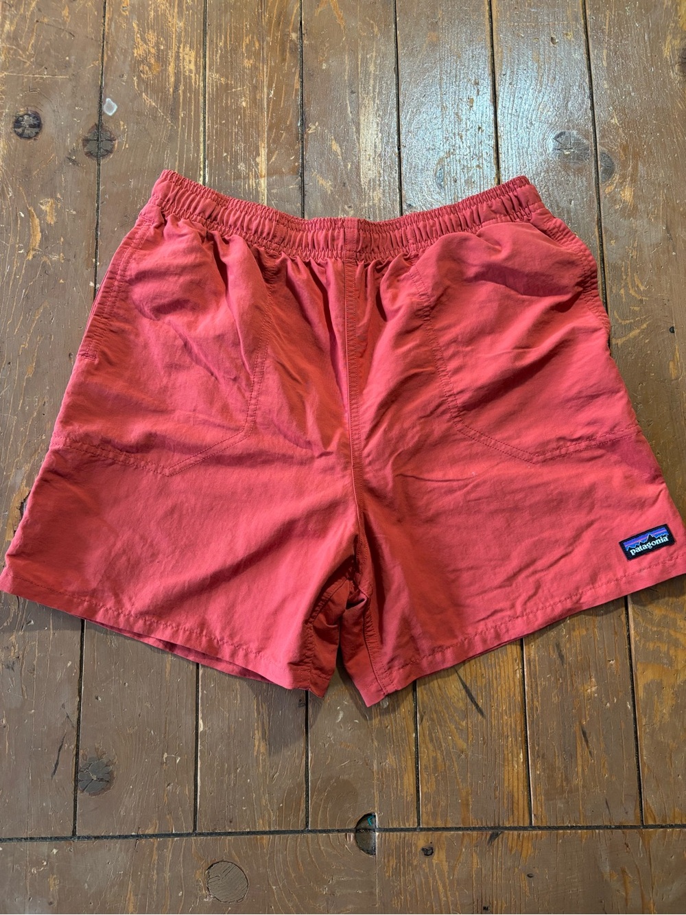 Patagonia Boys Baggies Shorts in the Color Sumac Red